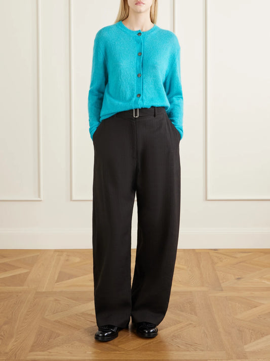 Image of a model wearing Outerwear. Product name - Callen Knitted Cardigan in Blue colour by brand - Studio Nicholson