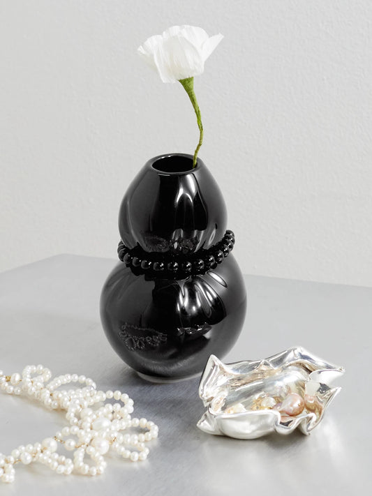 Image of Decor. Product name - Squeezed Pearl-like Embellished Glazed Ceramic Vase in Black colour by brand - Completedworks
