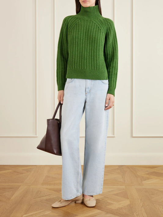 Image of a model wearing Outerwear. Product name - Ribbed Cashmere Turtleneck Sweater in Green colour by brand - Allude