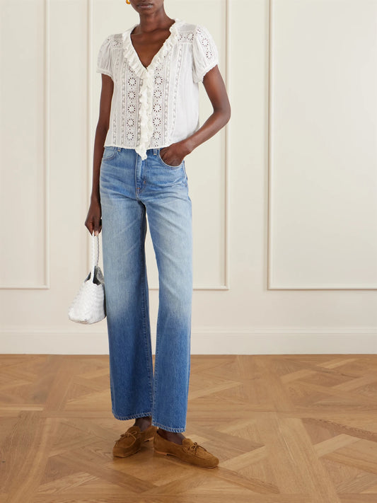 Image of a model wearing Tops. Product name - Clairette Cropped Ruffled Lace-trimmed Organic Cotton-voile Top in White colour by brand - DÔEN
