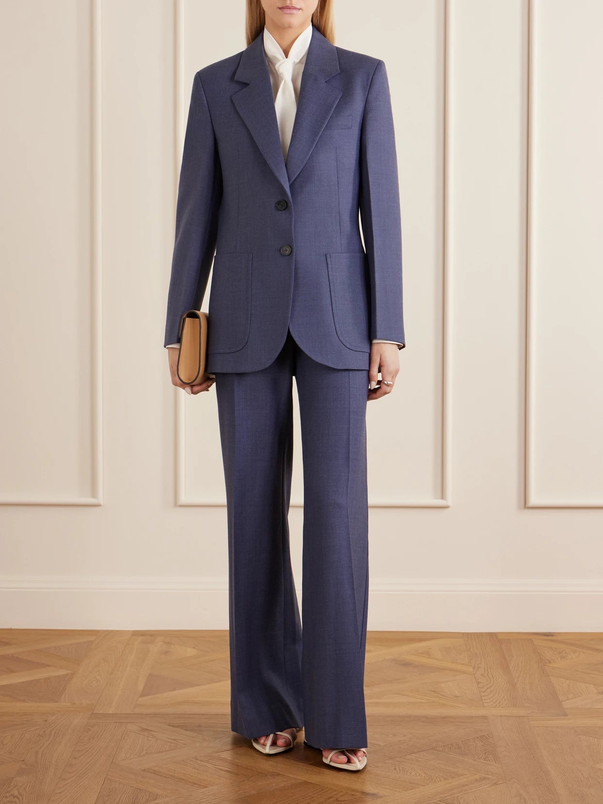 Image of a model wearing Outerwear. Product name - Katherine Twill Blazer in Blue colour by brand - Victoria Beckham