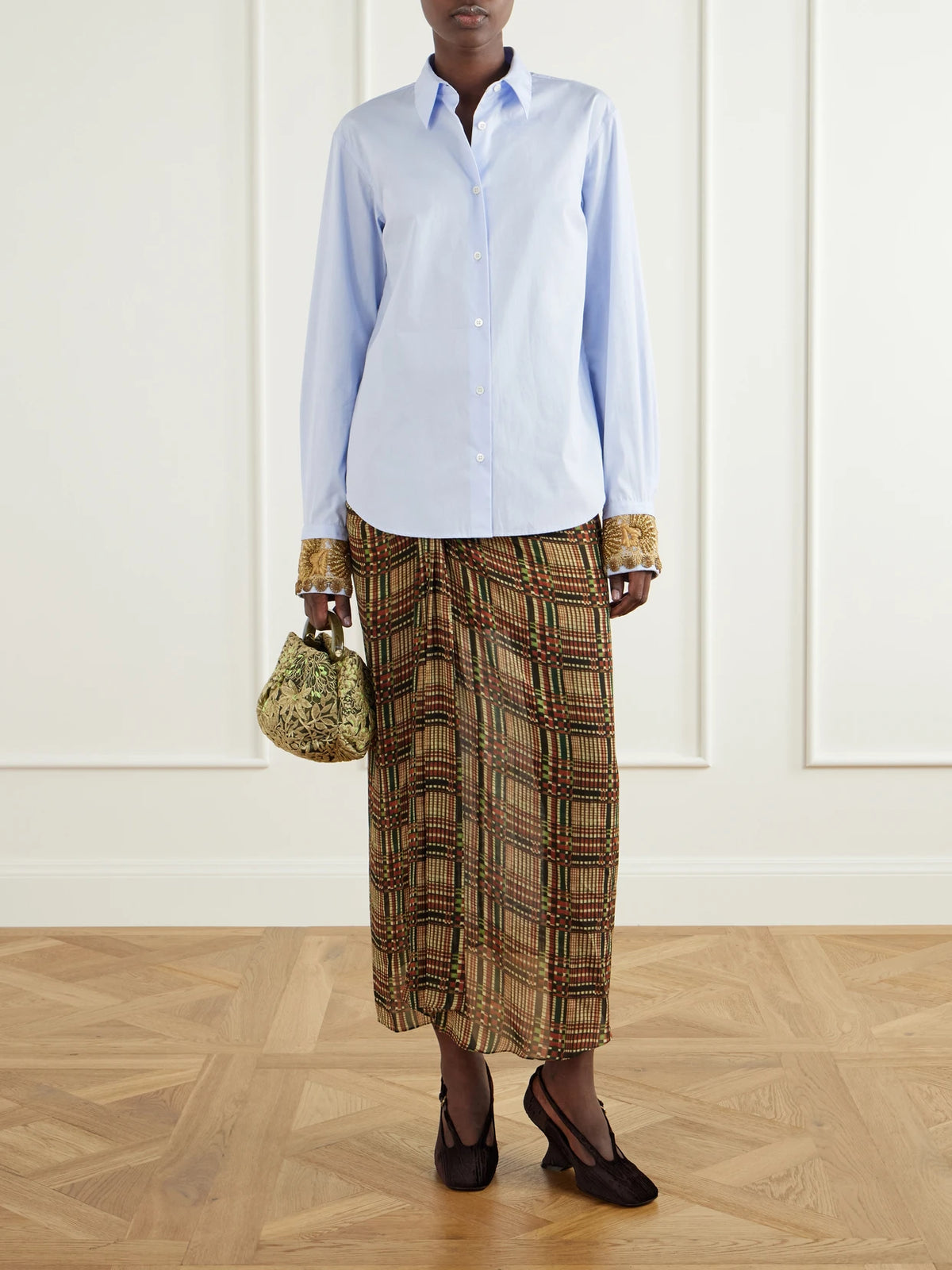 Image of a model wearing Tops. Product name - Embroidered Cotton-poplin Shirt in Light blue, White, Pink colour by brand - Dries Van Noten