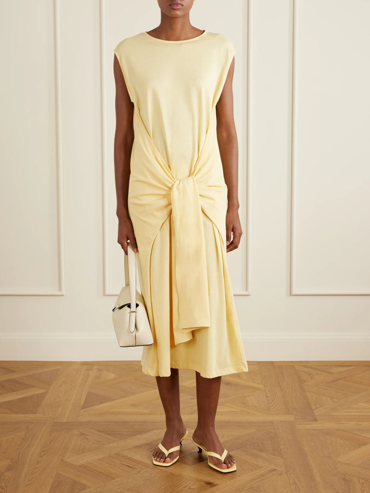 Image of Heels. Product name - Naplack Leather Thong Sandals in Pastel yellow colour by brand - TOTEME