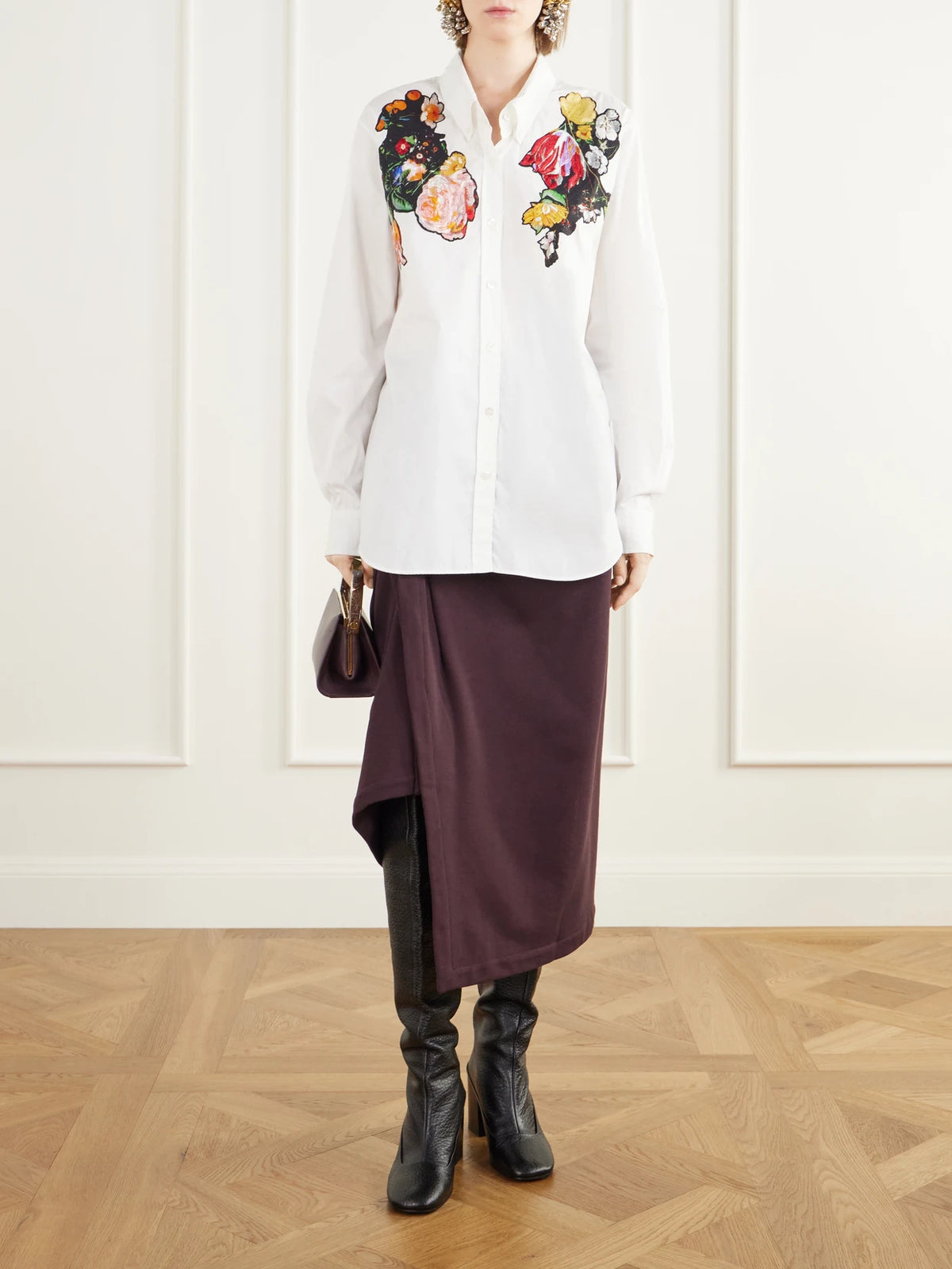 Image of a model wearing Tops. Product name - Floral-embroidered Cotton-poplin Shirt in White colour by brand - Dries Van Noten