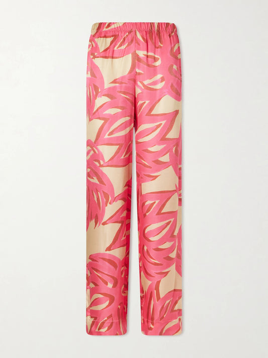 Image of a model wearing Pants. Product name - Ismene Wide-leg Silk-blend Pants in Pink colour by brand - Themis Z