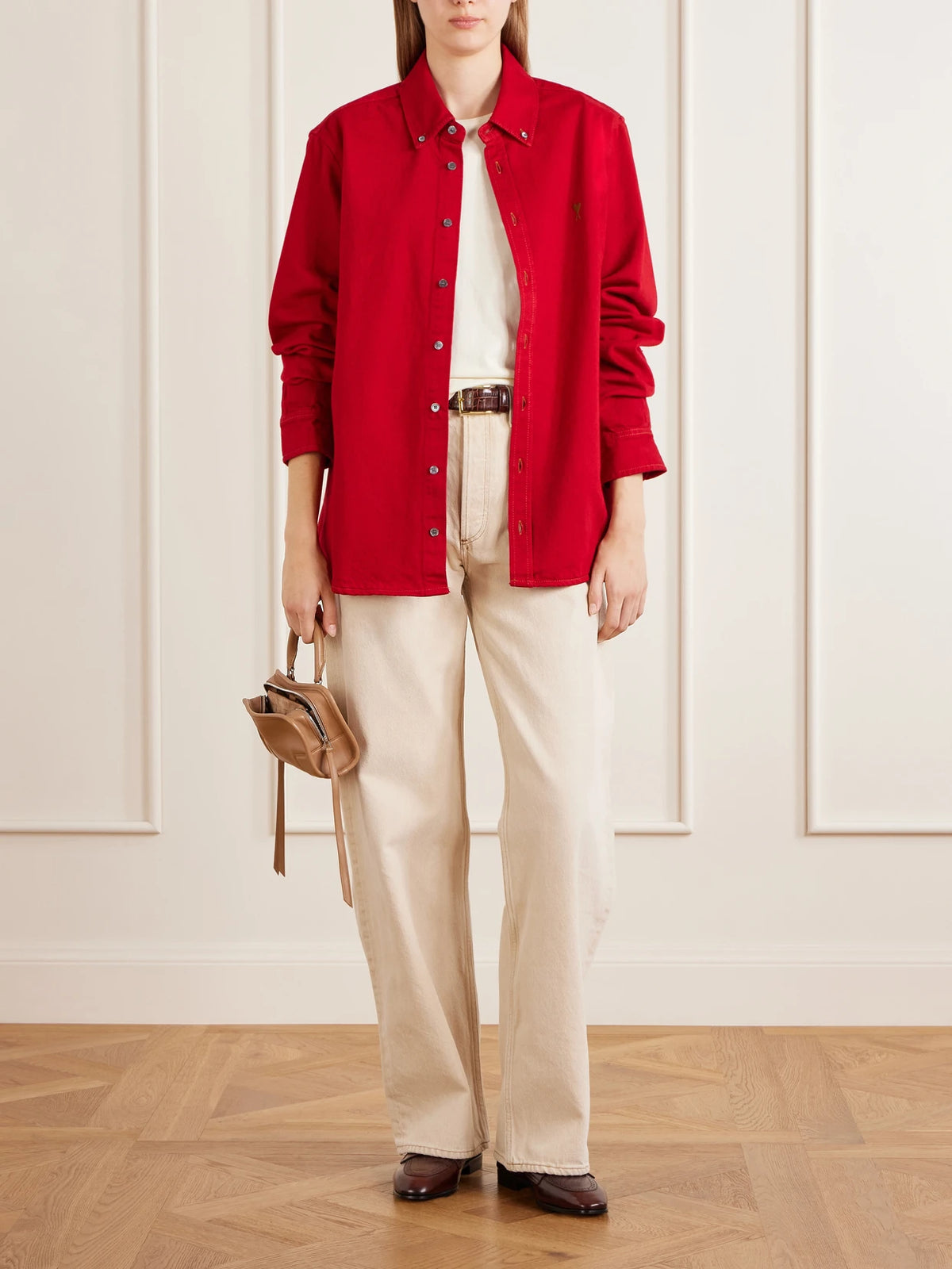 Image of a model wearing Tops. Product name - Logo-embroidered Cotton-twill Shirt in Multi colour by brand - AMI PARIS