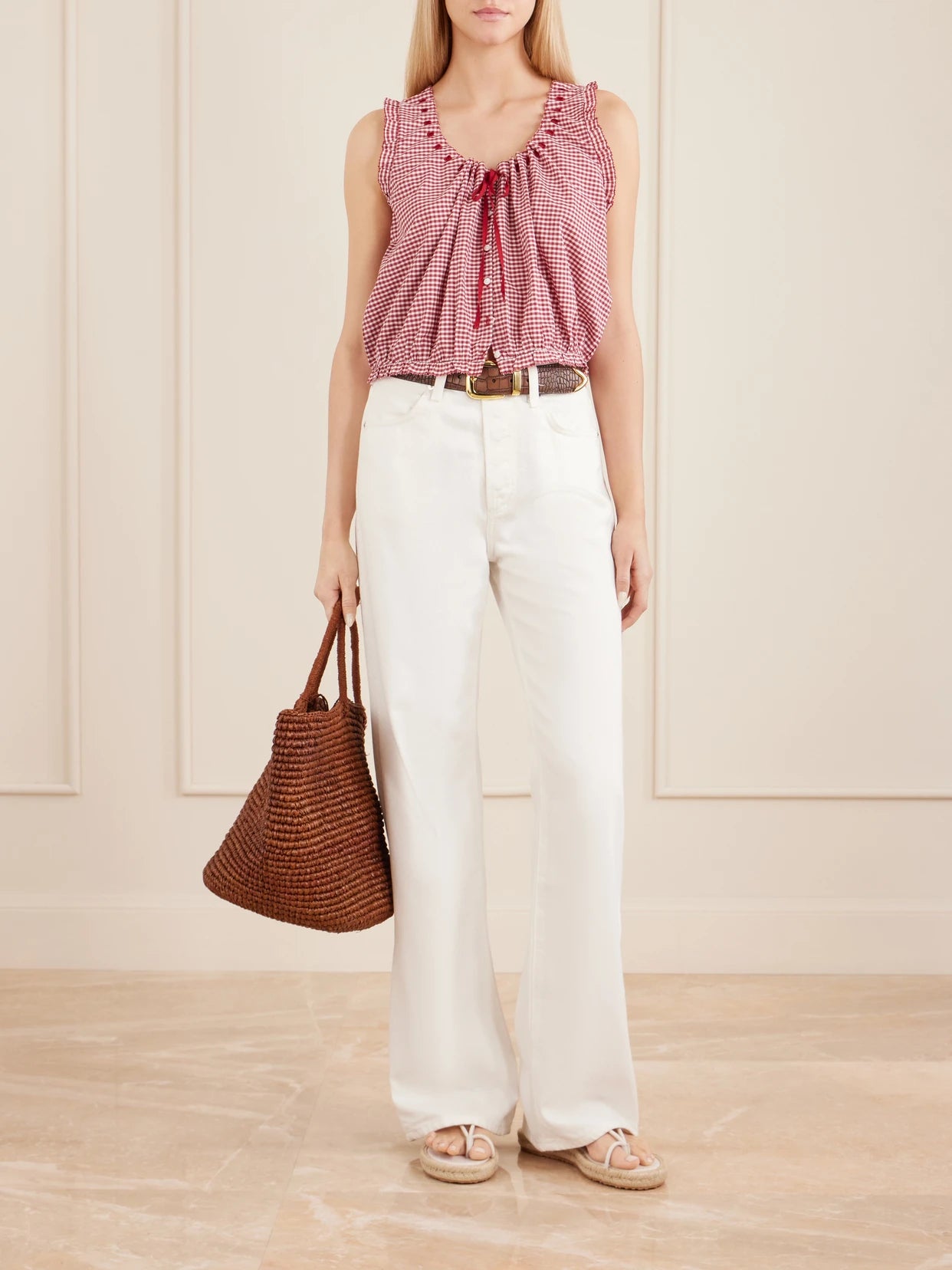 Image of a model wearing Tops. Product name - Traveler Gathered Checked Organic Cotton Blouse in xx small colour by brand - DÔEN