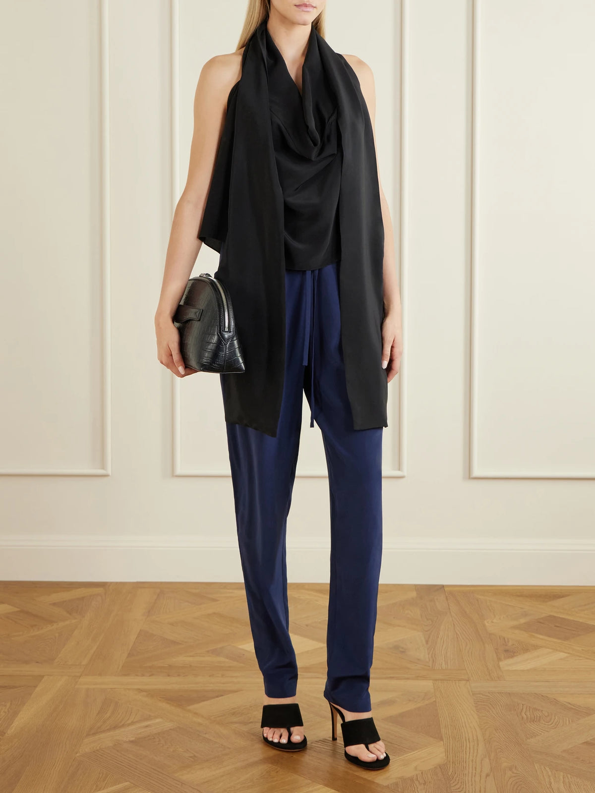 Image of a model wearing Pants. Product name - The Vardar Silk-blend Straight-leg Pants in Navy colour by brand - Sharon Wauchob
