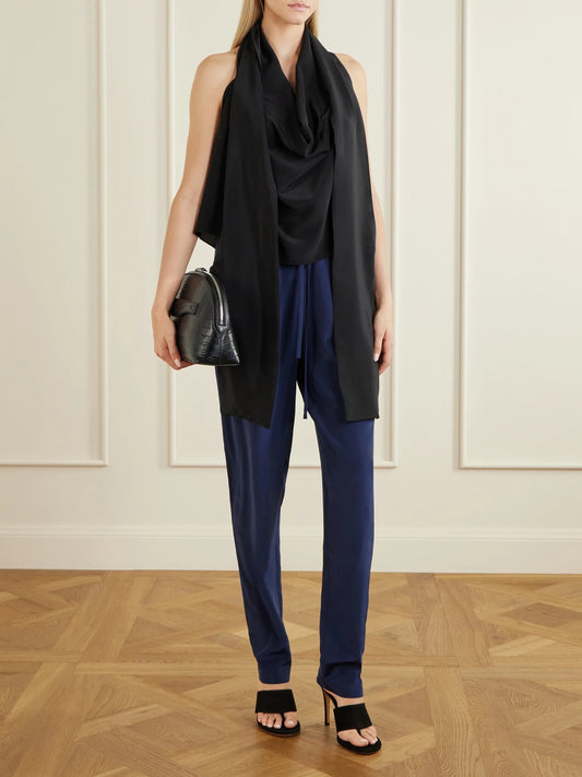 Image of a model wearing Pants. Product name - The Vardar Silk-blend Straight-leg Pants in Navy colour by brand - Sharon Wauchob