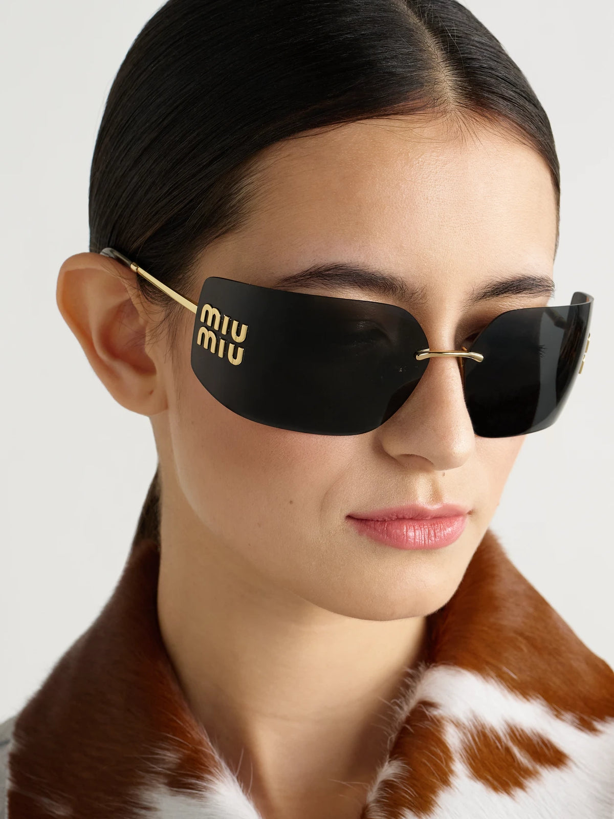 Image of Sunglasses. Product name - D-frame Gold-tone Sunglasses in Black colour by brand - Miu Miu Eyewear