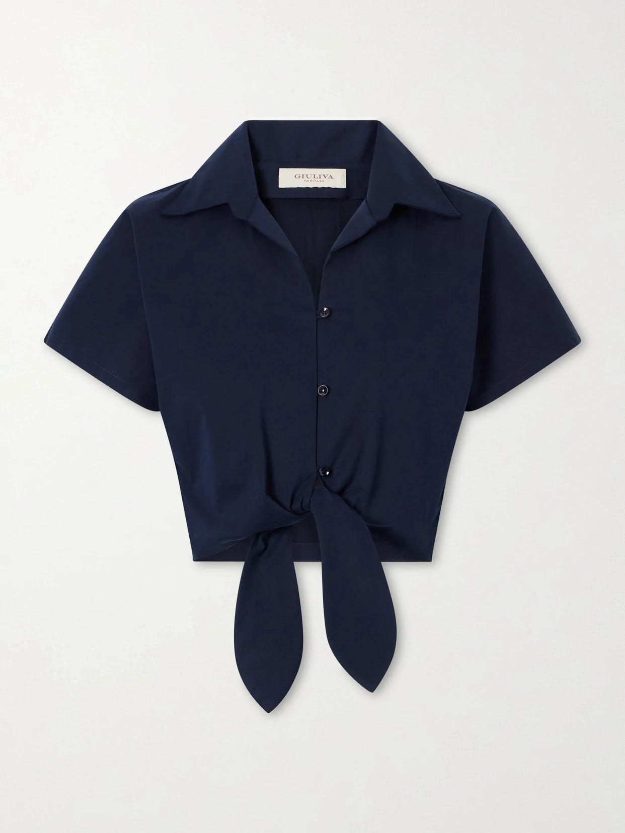 Image of a model wearing Tops. Product name - Tilda Cropped Tie-front Cotton-blend Shirt in Navy colour by brand - Giuliva Heritage