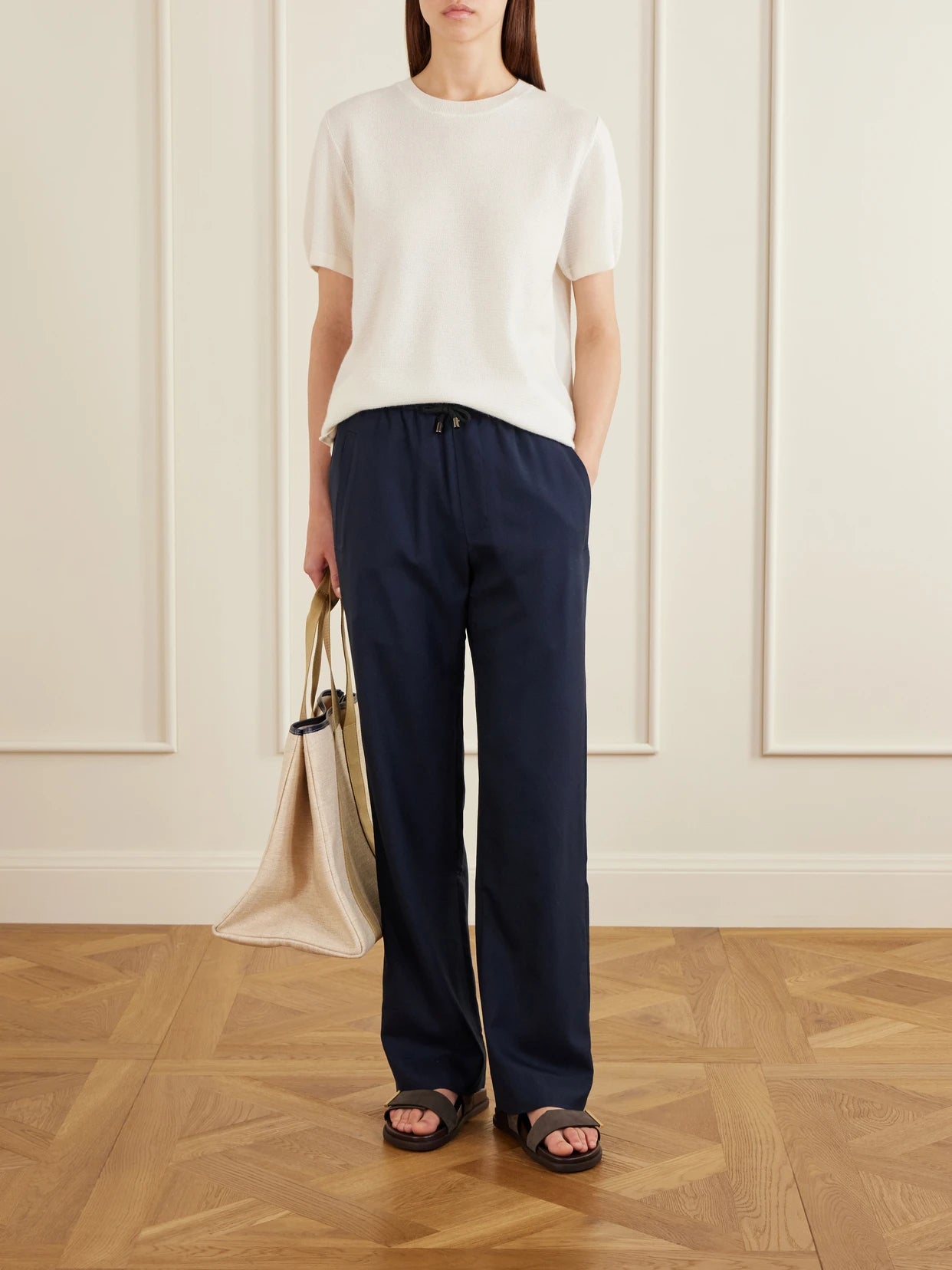 Image of a model wearing Pants. Product name - Soul Cashmere Straight-leg Pants in Navy colour by brand - God's True Cashmere