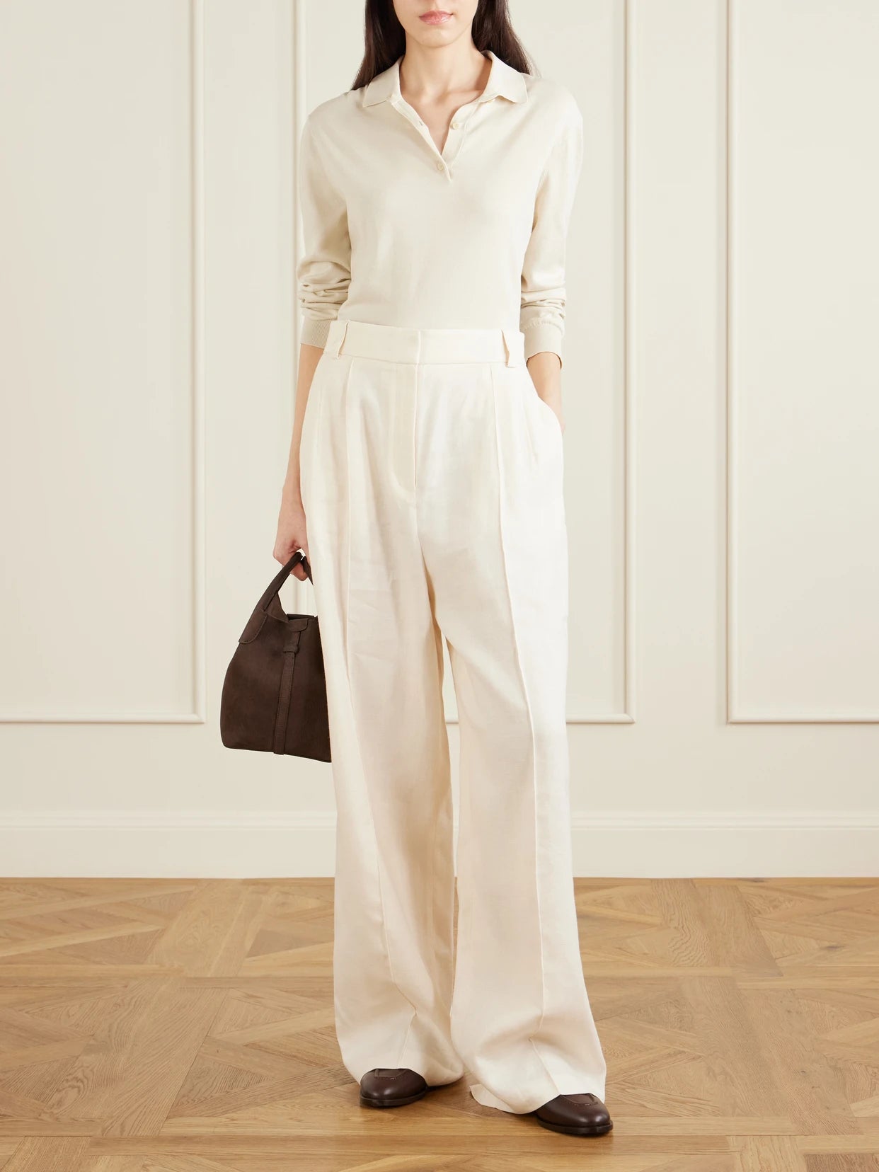Image of a model wearing Pants. Product name - Lodger Linen And Wool-blend Wide-leg Pants in Off-white colour by brand - Loro Piana