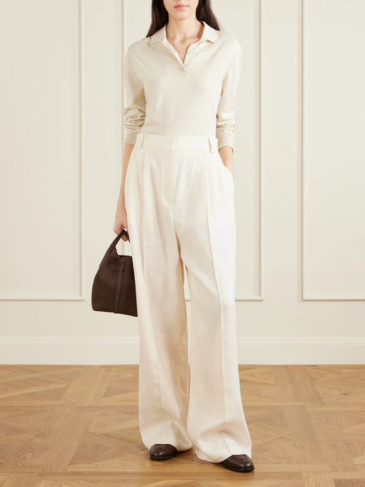 Image of a model wearing Pants. Product name - Lodger Linen And Wool-blend Wide-leg Pants in Off-white colour by brand - Loro Piana