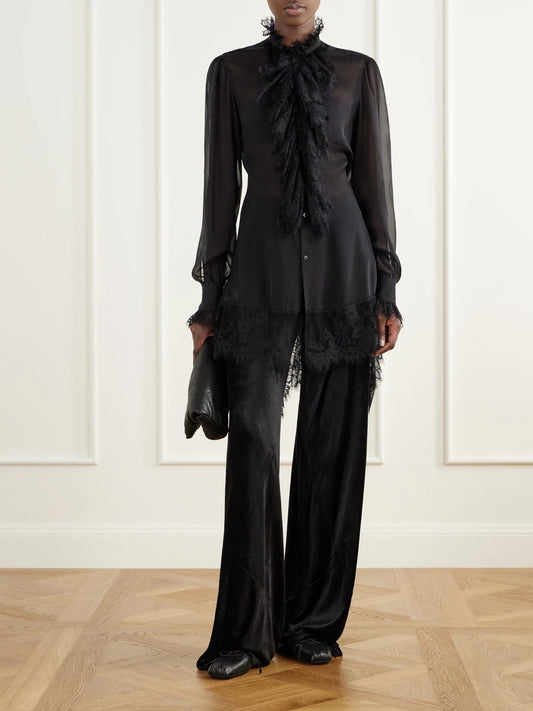Image of a model wearing Tops. Product name - Barah Ruffled Lace-trimmed Silk-chiffon Blouse in Black colour by brand - Ann Demeulemeester