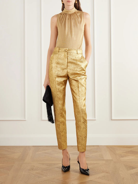 Image of a model wearing Tops. Product name - Gathered Mesh Knit Top in Gold colour by brand - Dolce & Gabbana