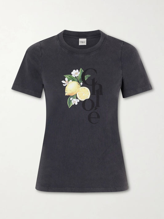 Image of a model wearing Tops. Product name - Printed Cotton-jersey T-shirt in Black colour by brand - Chloé