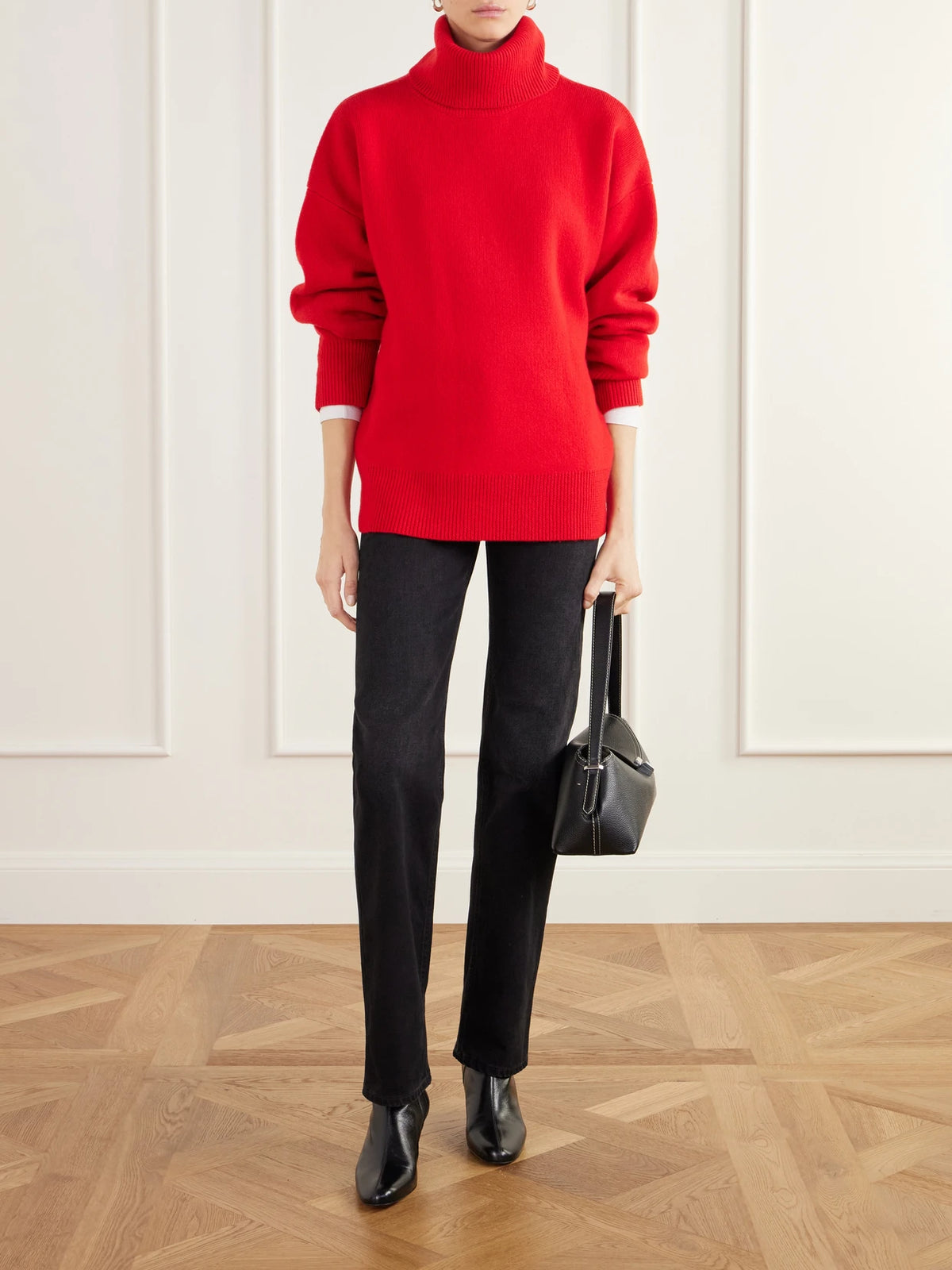 Image of a model wearing Outerwear. Product name - Brushed Wool-blend Turtleneck Sweater in Red colour by brand - TOTEME