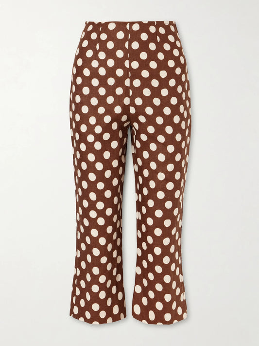 Image of a model wearing Pants. Product name - Valeria Polka-dot Linen Straight-leg Capri Pants in Brown colour by brand - Faithfull