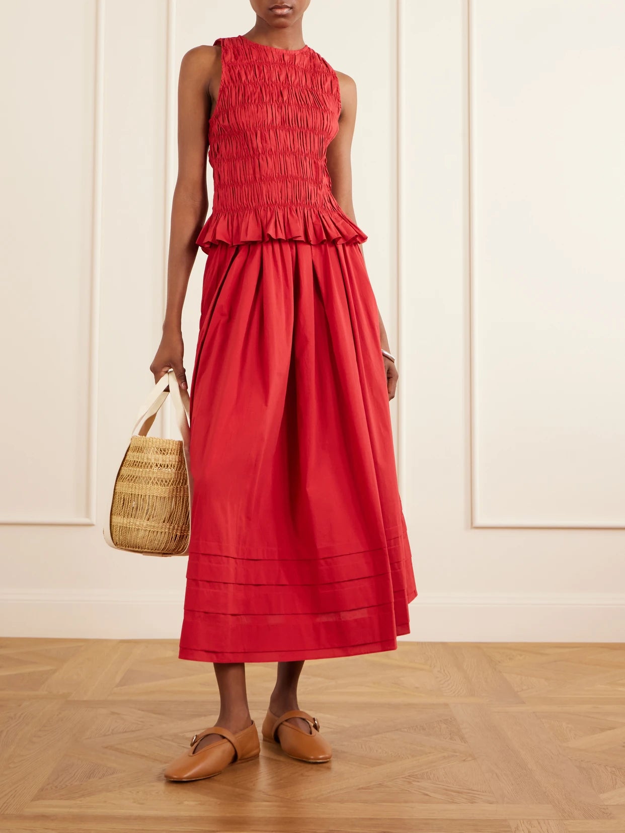 Image of a model wearing Tops. Product name - Cales Shirred Cotton Top in x small colour by brand - Faithfull