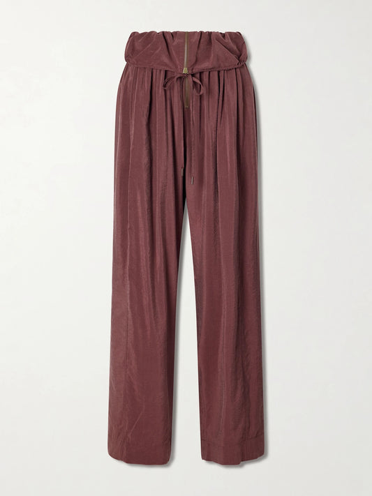 Image of a model wearing Pants. Product name - Silk-blend Wide-leg Pants in Dark purple colour by brand - Chloé