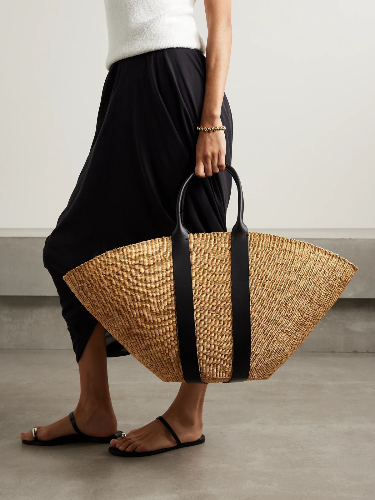Image of Bags. Product name - Sophie Maxi Leather-trimmed Woven Straw Tote in Brown colour by brand - MUUÑ
