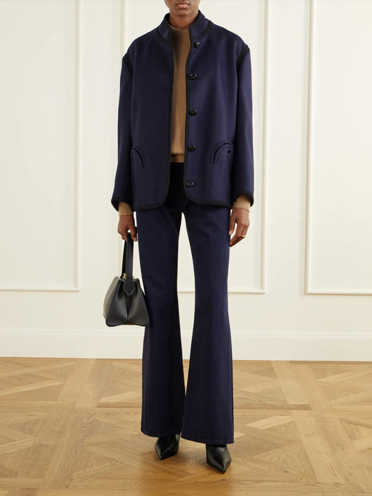 Image of a model wearing Outerwear. Product name - Racka Ribbed Wool And Cashmere-blend Sweater in Camel colour by brand - BLAZÉ Milano