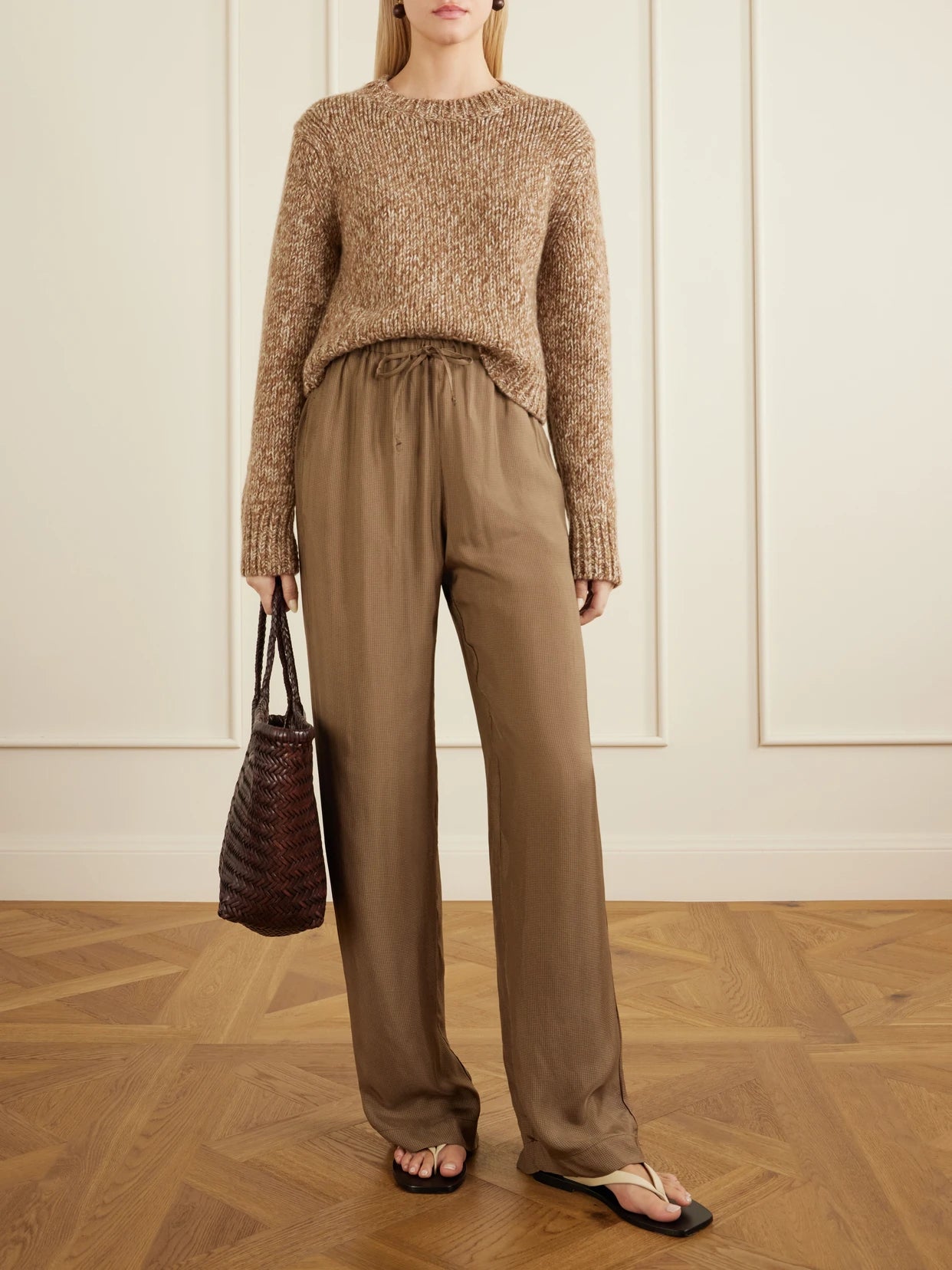 Image of a model wearing Outerwear. Product name - Pathayi Organic Cashmere Sweater in Camel colour by brand - Le Kasha