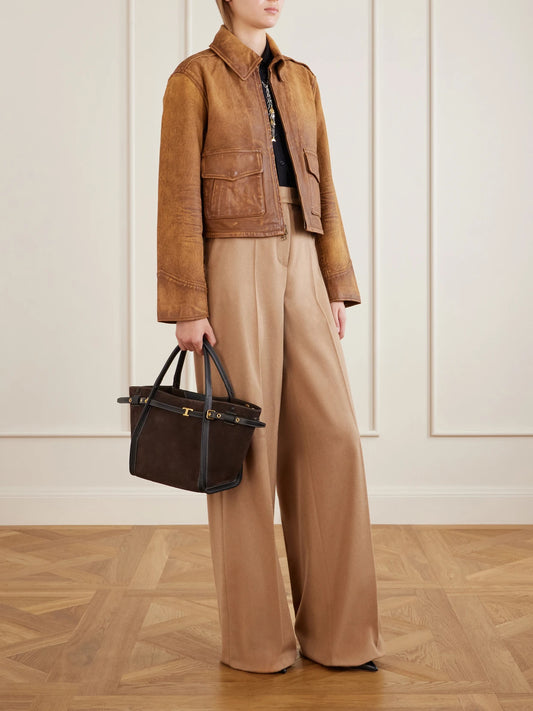 Image of a model wearing Pants. Product name - Camel Wool Wide-leg Pants in Multi colour by brand - Max Mara