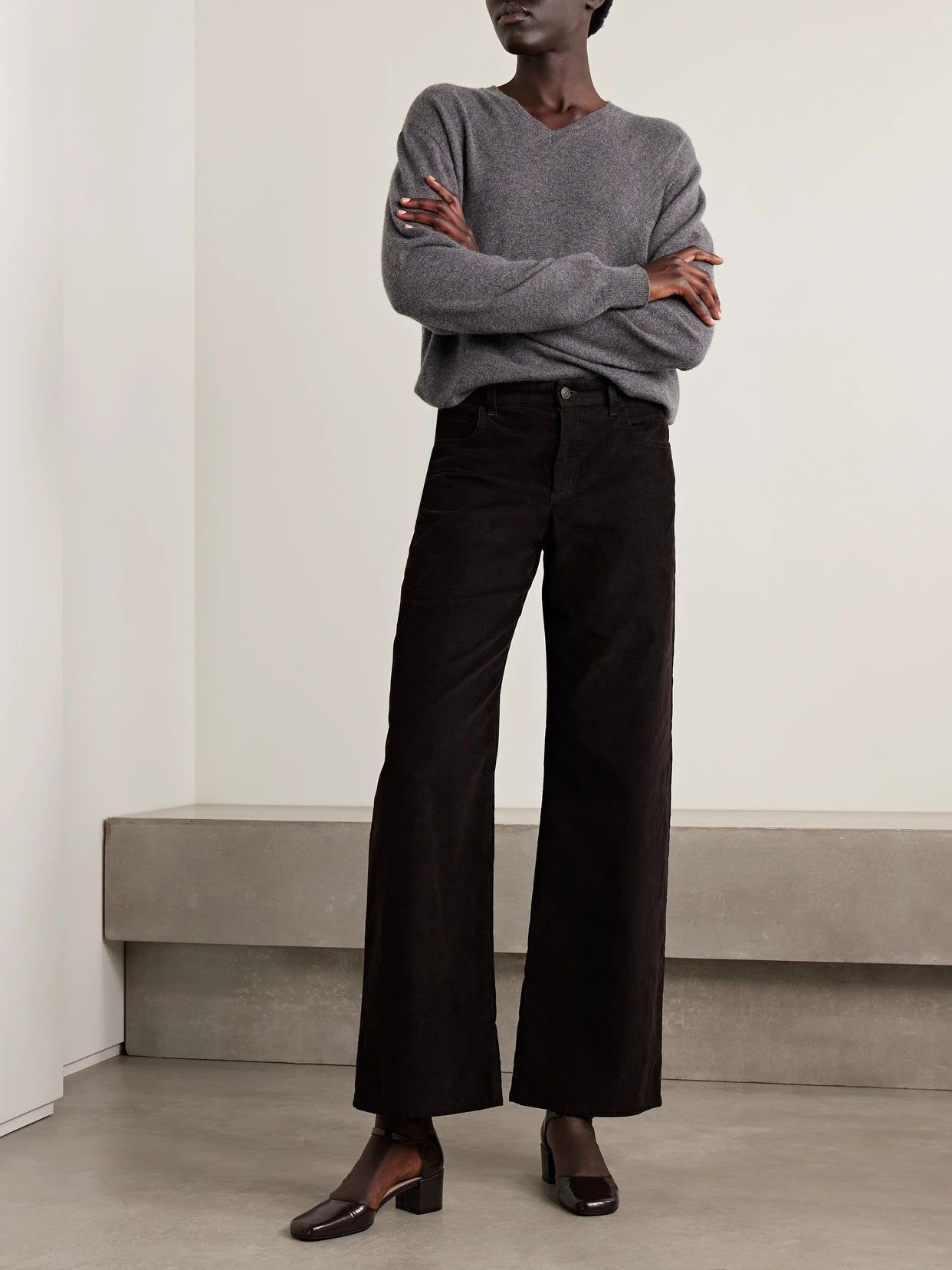 Image of a model wearing Pants. Product name - Eglitta Cotton-blend Corduroy Straight-leg Pants in Brown colour by brand - The Row