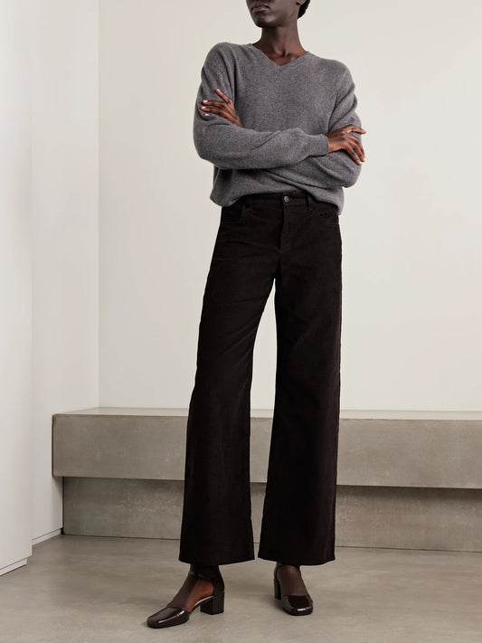 Image of a model wearing Pants. Product name - Eglitta Cotton-blend Corduroy Straight-leg Pants in Brown colour by brand - The Row