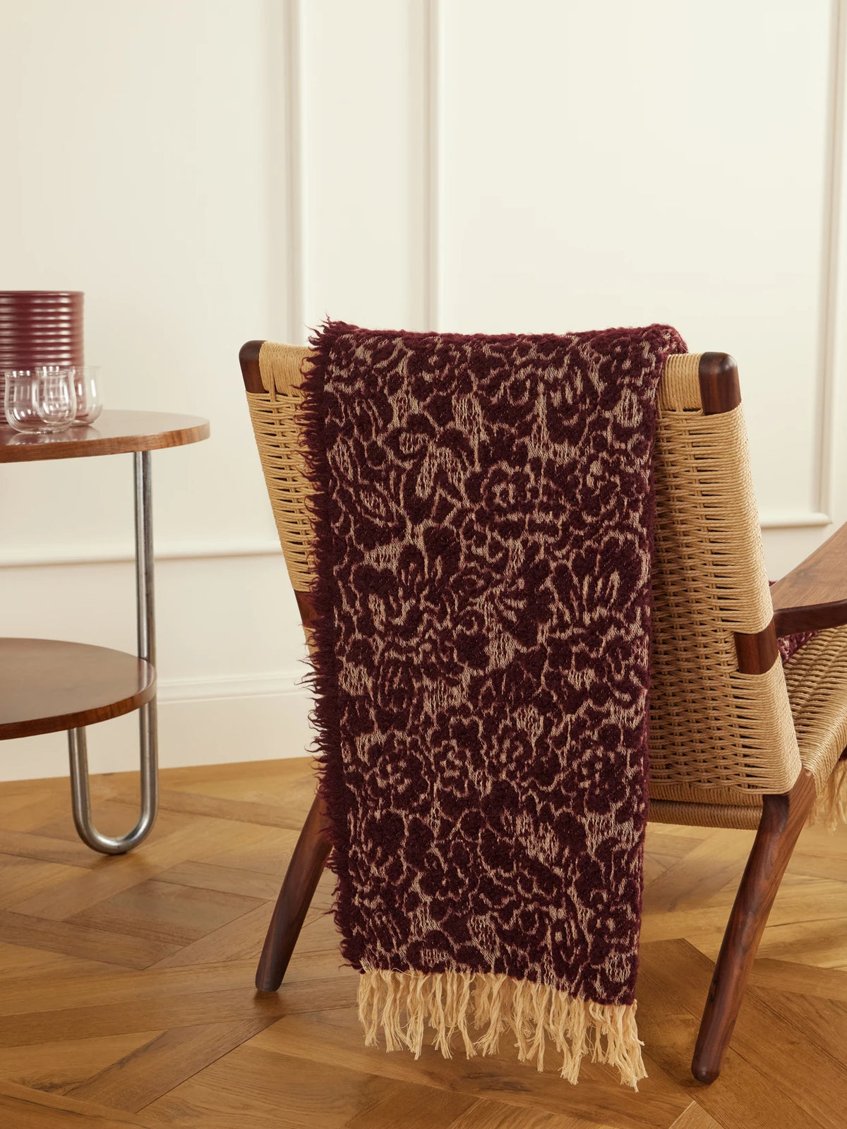 Image of Decor. Product name - Malghe Fringed Floral-jacquard Wool-blend Throw in Burgundy colour by brand - The House of Lyria