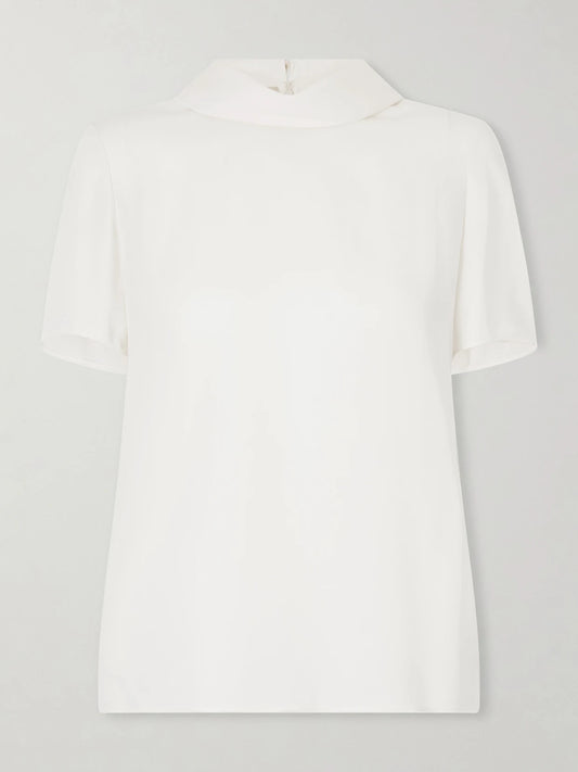 Image of a model wearing Tops. Product name - Silk-georgette Blouse in Cream colour by brand - Valentino Garavani