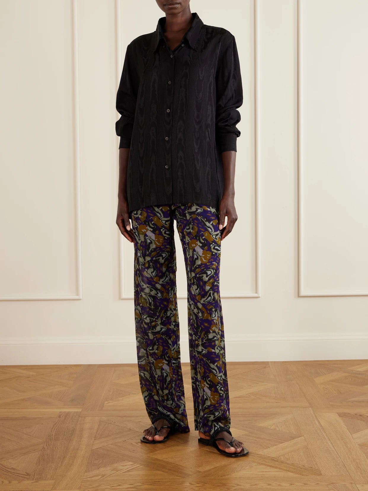 Image of a model wearing Pants. Product name - Printed Georgette Straight-leg Pants in Purple colour by brand - Dries Van Noten