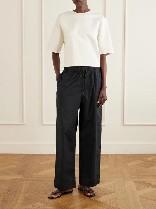 Image of Sleepwear & Loungewear. Product name - Cotton-blend Straight-leg Pants in Black colour by brand - SKIMS
