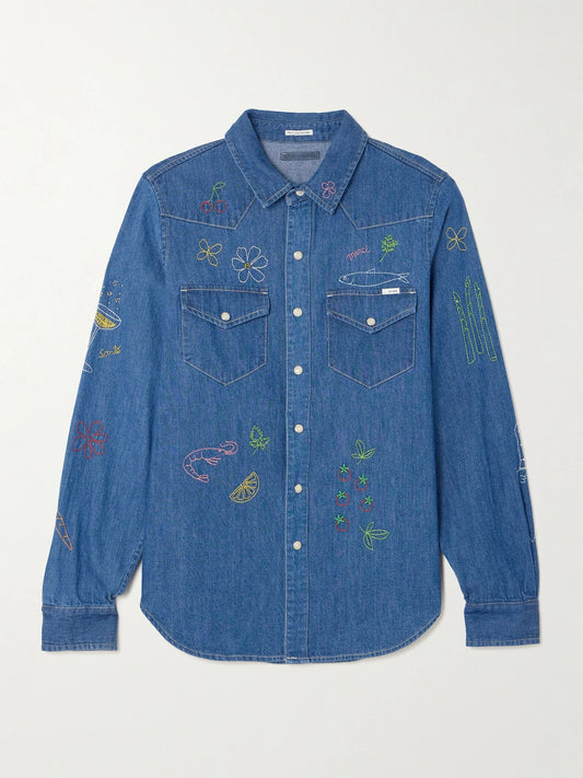 Image of a model wearing Tops. Product name - All My Eyes Embroidered Denim Shirt in Blue colour by brand - Mother