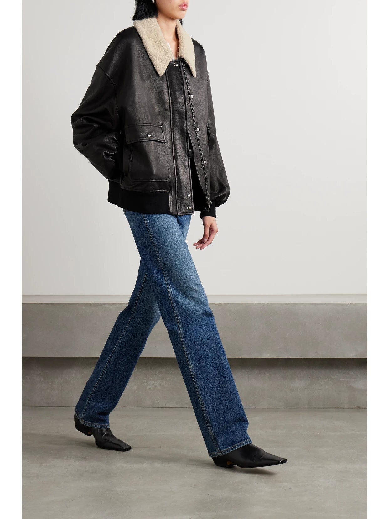 Image of Coats & Jackets. Product name - Shellar Shearling-trimmed Leather Jacket in Black colour by brand - KHAITE