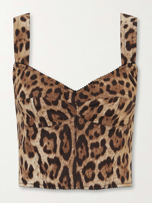 Image of a model wearing Tops. Product name - Cropped Leopard-print Stretch-canvas Bustier Top in Leopard print colour by brand - Dolce & Gabbana