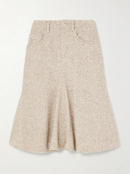 Image of a model wearing Skirts. Product name - Herring Bone Wool-blend Midi Skirt in Beige colour by brand - Brunello Cucinelli