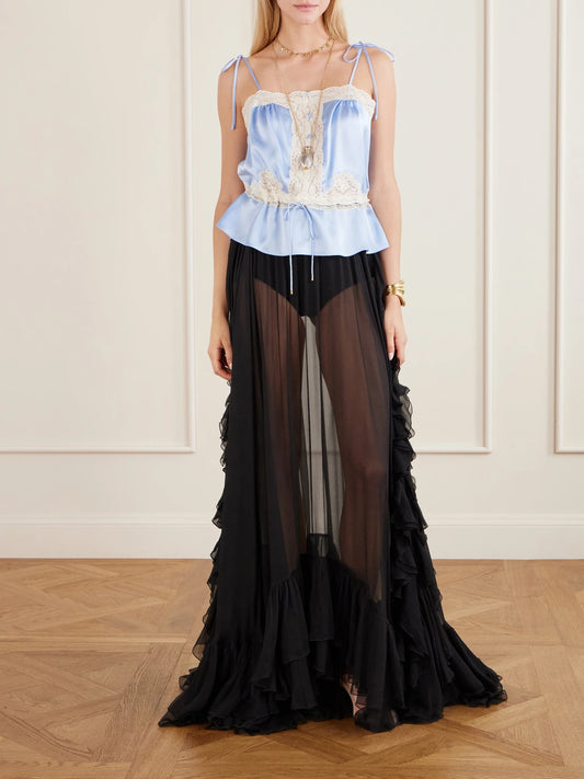 Image of a model wearing Skirts. Product name - Ruffled Silk-crepon Maxi Skirt in Black colour by brand - Chloé
