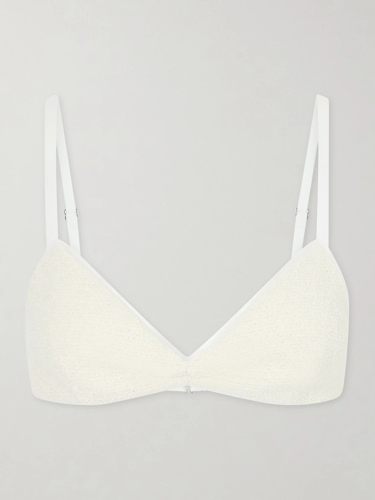 Image of a model wearing Tops. Product name - Talita Cotton-blend Poplin Bralette in Neutral colour by brand - KHAITE