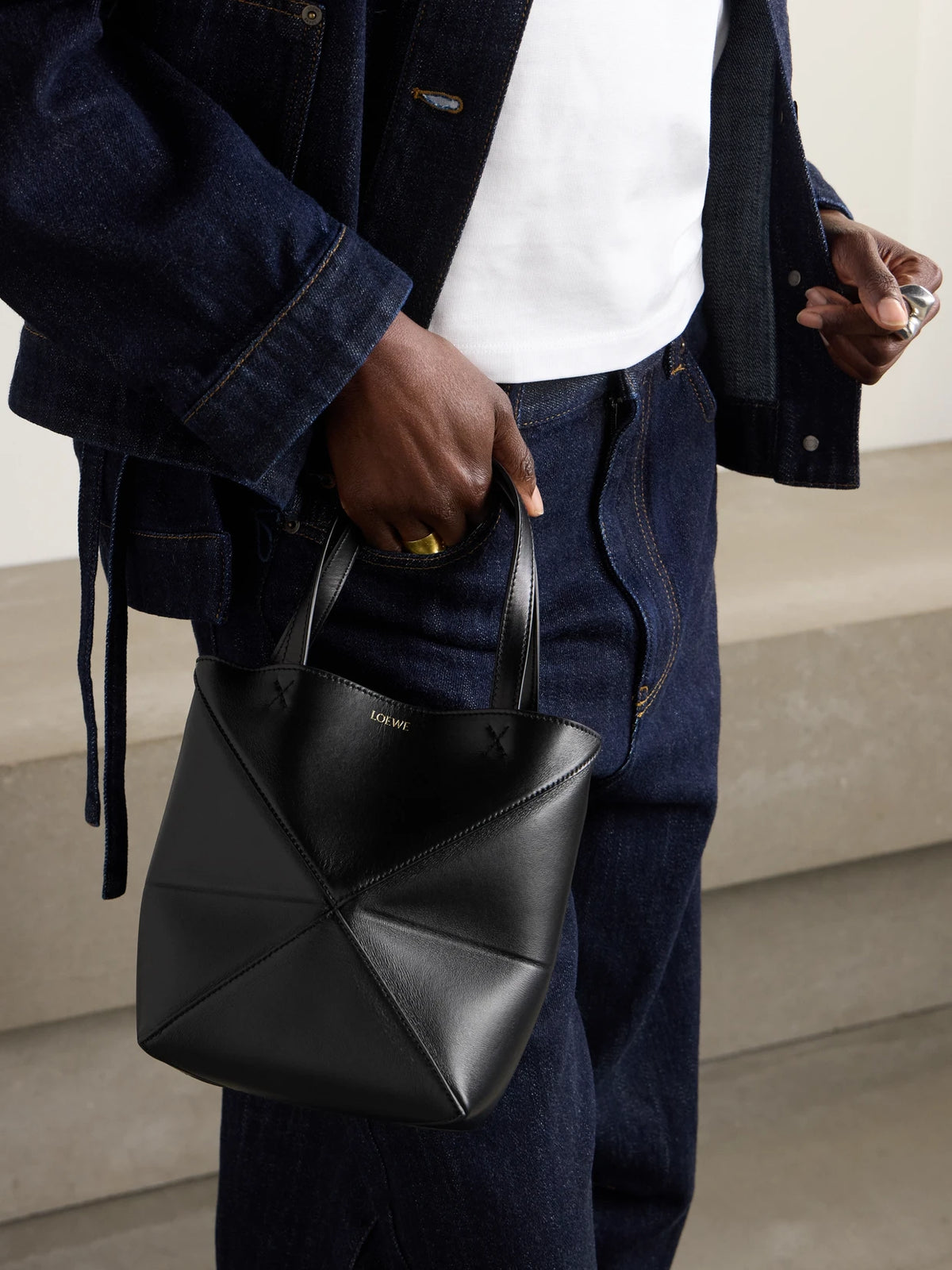 Image of Bags. Product name - Puzzle Fold Convertible Mini Leather Tote in Black colour by brand - LOEWE