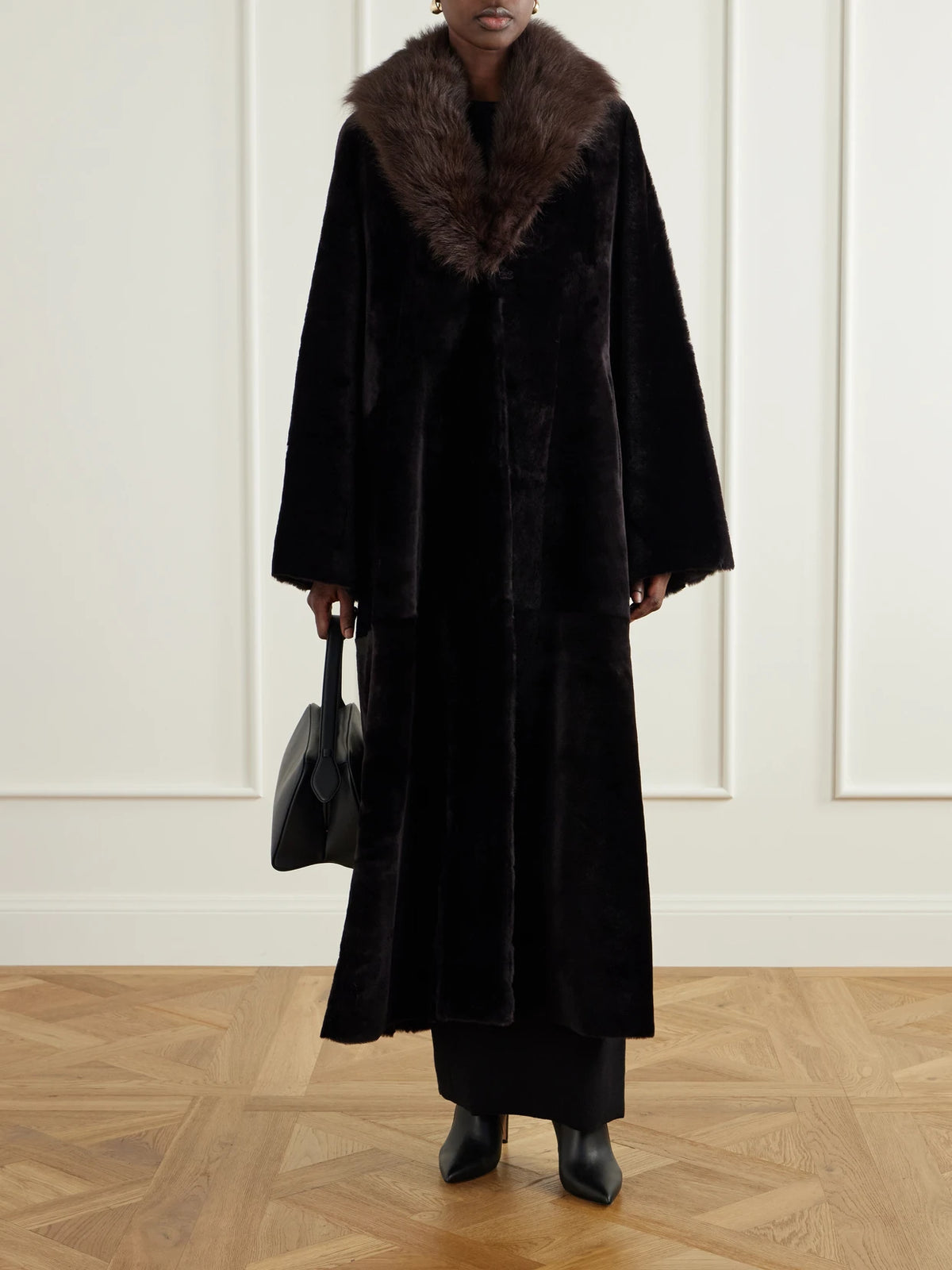 Image of Coats & Jackets. Product name - Astoria Shearling Coat in Black colour by brand - Nour Hammour