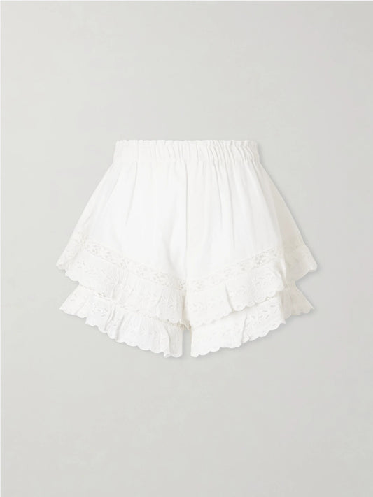 Image of a model wearing Shorts. Product name - Eliza Embroidered Cotton-blend Shorts in White colour by brand - Sea