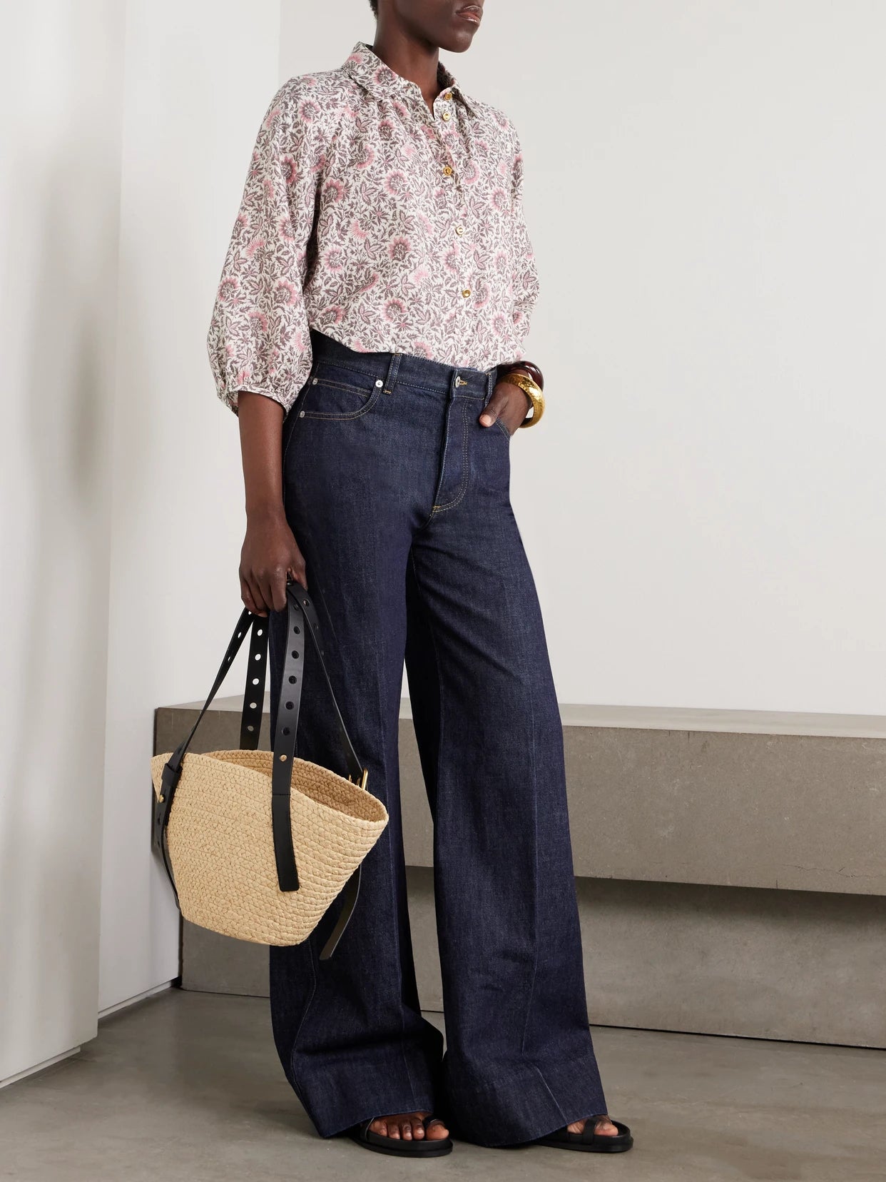 Image of a model wearing Tops. Product name - Olivia Oversized Printed Linen Shirt in Multi colour by brand - Loro Piana