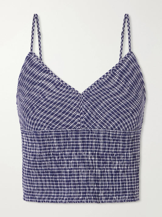 Image of a model wearing Tops. Product name - Anora Smocked Striped Stretch-knit Cotton-blend Top in Blue colour by brand - La Ligne