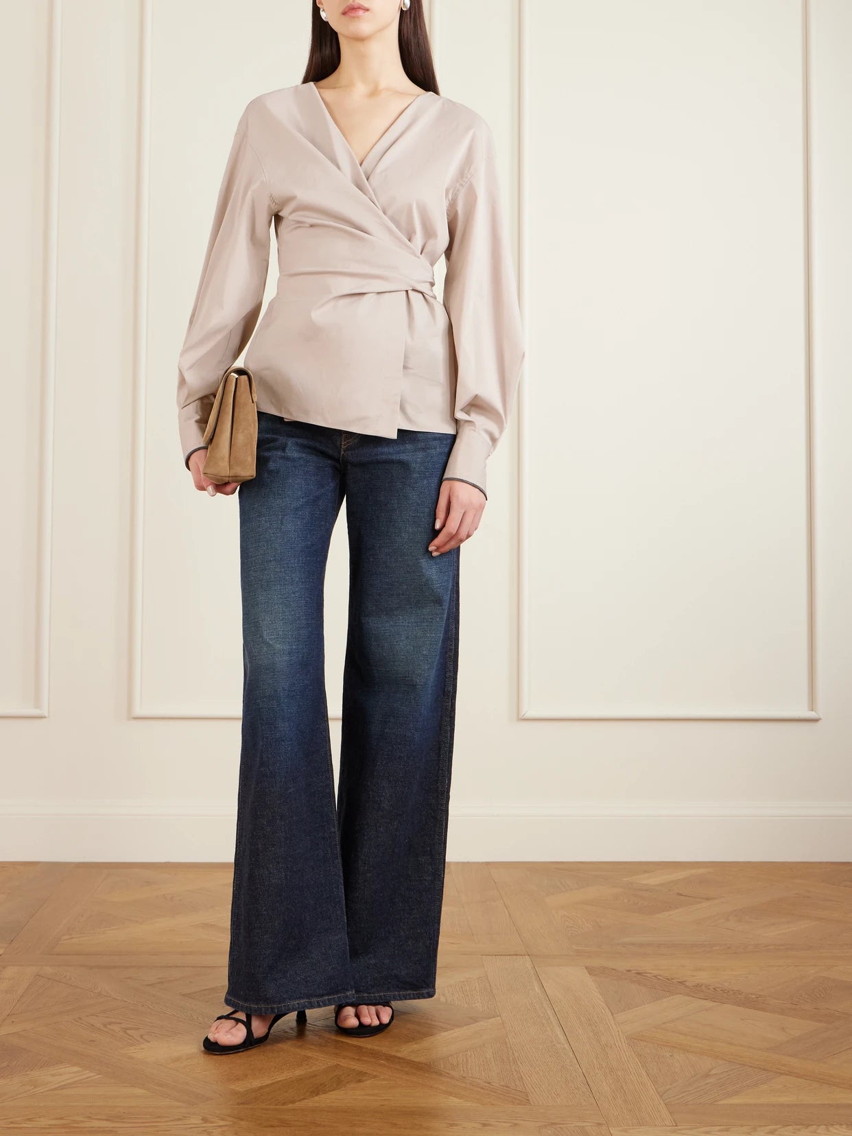 Image of a model wearing Tops. Product name - Embellished Cotton-blend Poplin Wrap Blouse in Beige colour by brand - Brunello Cucinelli