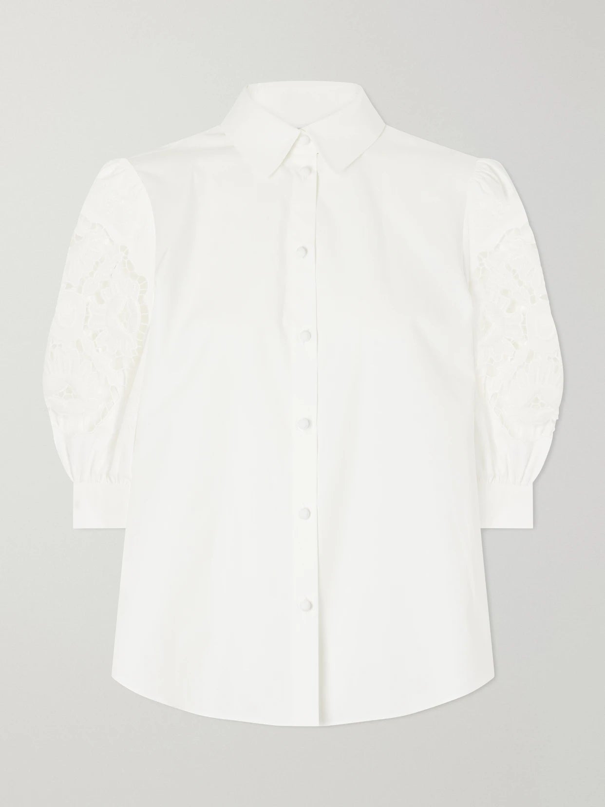 Image of a model wearing Tops. Product name - Broderie Anglaise-trimmed Cotton-poplin Shirt in White colour by brand - Valentino Garavani