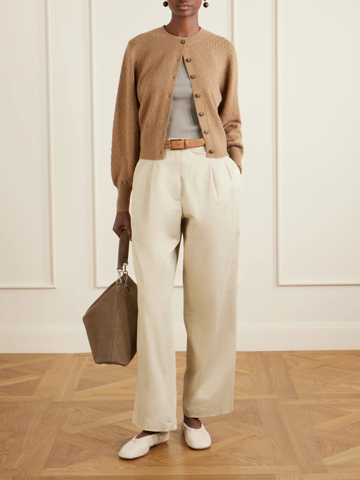 Image of a model wearing Outerwear. Product name - Gaya Pointelle Knit Cashmere Cardigan in Camel colour by brand - Le Kasha
