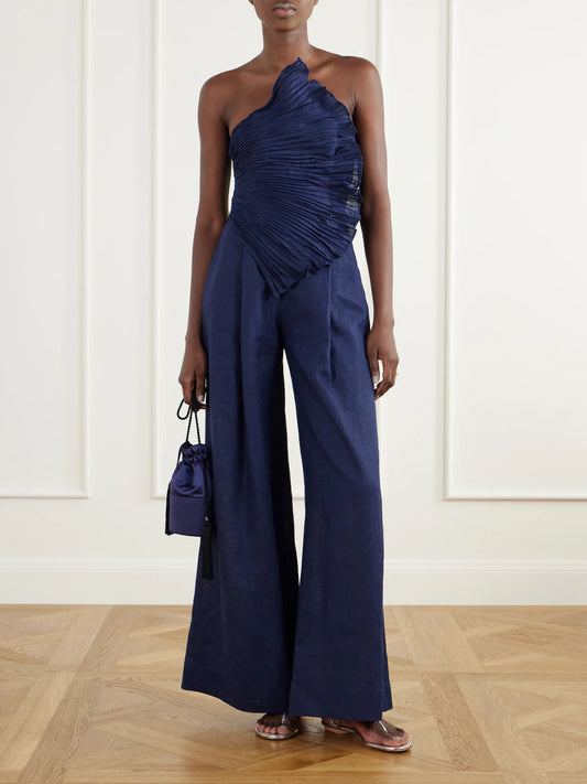 Image of Bodysuits. Product name - Ainma Pleated Linen-woven Jumpsuit in Navy colour by brand - Andres Otalora